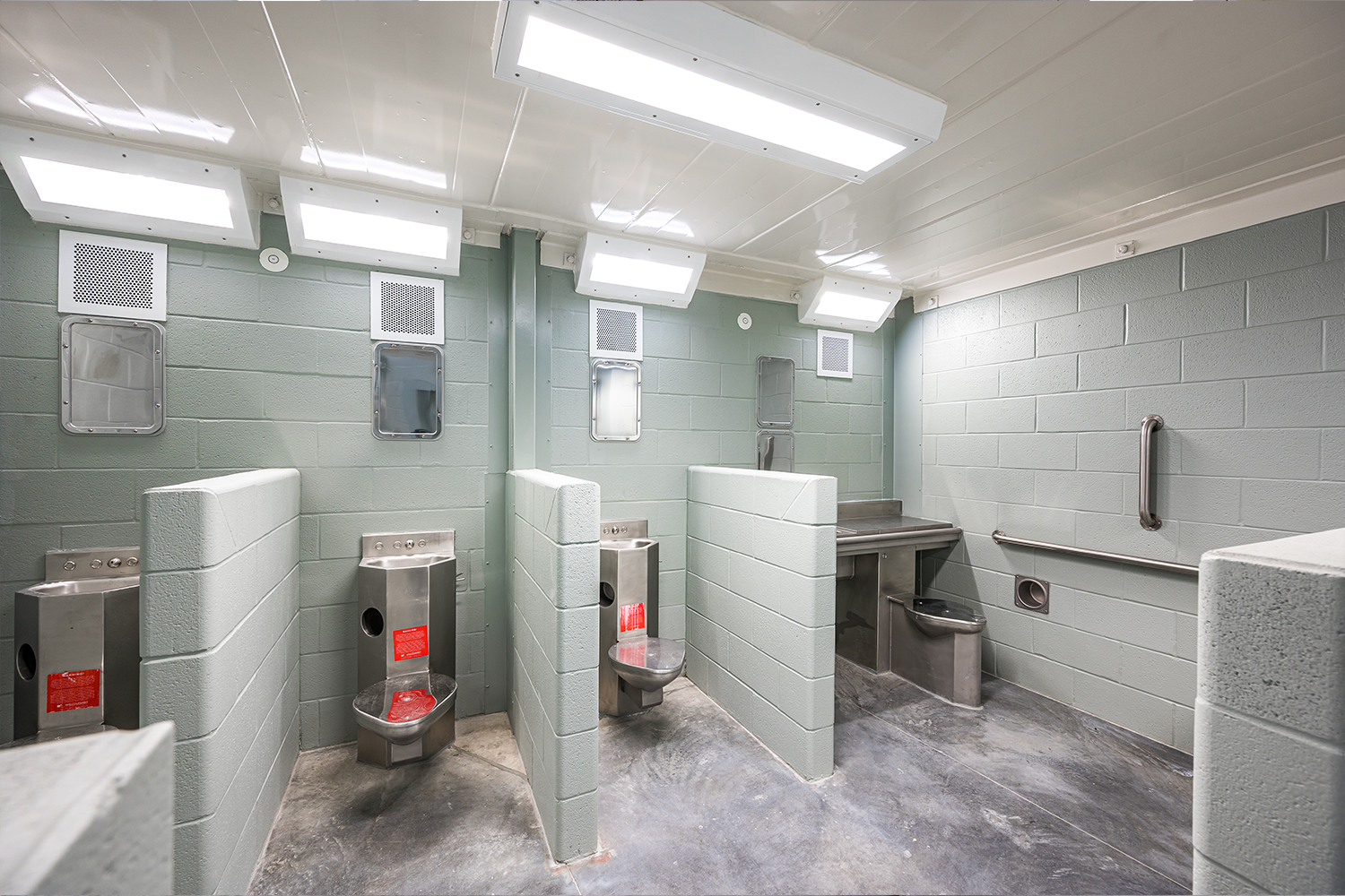 Prison Bathroom at Fulton County Jail featuring Kenall Correctional luminaires